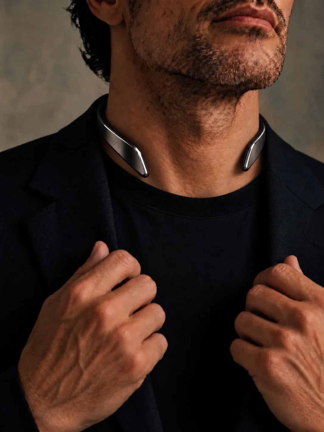 The Adalyon neckpiece, worn under an open collar